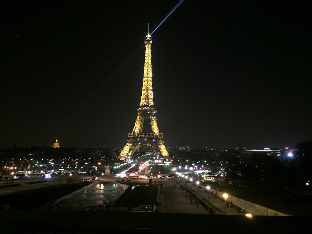 Eiffel Tower by night in Paris